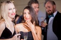 Women Being Watched by Men at Party and Cringing Royalty Free Stock Photo