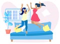 Two Pretty Women Having Fun at Home Jump on Sofa Royalty Free Stock Photo