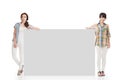 Two pretty women showing an empty board Royalty Free Stock Photo