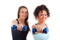 Two pretty, young girls exercising with weights Royalty Free Stock Photo