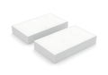Two pristine white rectangular blocks standing upright against a white background Royalty Free Stock Photo