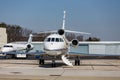 Two Private Jets by Hangers Royalty Free Stock Photo