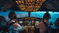 Two professional aviators sitting in cockpit during flight Royalty Free Stock Photo