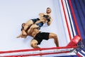 Two professional fighters punching or boxing  in the fight ring. High angle view. Collage Royalty Free Stock Photo