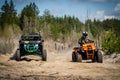 Two professional quad ride fast on sand. Quad racing, ATV 4x4