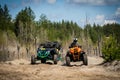 Two professional quad ride fast on sand. Quad racing, ATV 4x4 Royalty Free Stock Photo