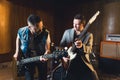 Two professional rock guitarist playing full of emotion Royalty Free Stock Photo