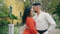 Two professionals performing salsa in city park. Happy couple dancing latino. Royalty Free Stock Photo