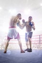 Two professionl boxers are fighting on arena Royalty Free Stock Photo