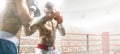 Two professionl boxers are fighting on arena Royalty Free Stock Photo