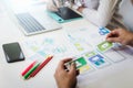 Two programmer discussing new project for developing technologies application designe of mobile phone. First process for sketch Royalty Free Stock Photo