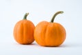 Two pumpkins isolated on white background