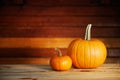 Two pumpkins on wooden table Royalty Free Stock Photo