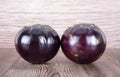 Two purple eggplants on the table Royalty Free Stock Photo