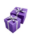 Two purple gift boxes with silver ribbon and bows on white present Royalty Free Stock Photo
