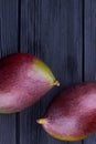 Two purple mangoes, top view. Royalty Free Stock Photo