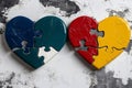 Two puzzle pieces in the shape of a heart Royalty Free Stock Photo