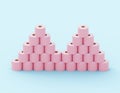 A two pyramids of pink toilet paper Royalty Free Stock Photo