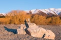 Two pyramids of stones built on top of two large rocks Royalty Free Stock Photo