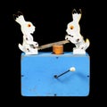 Two rabbits sawing a log Royalty Free Stock Photo