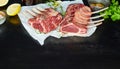 Two racks of lamb with raw chops Royalty Free Stock Photo