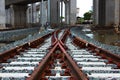 Two railway tracks converge into one track