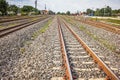 Two railway tracks merge together