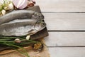 Two rainbow trouts on rustic wooden table Royalty Free Stock Photo