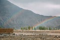 Two rainbows after raining in highland mountain area in Leh, India Royalty Free Stock Photo