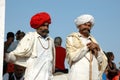 Two Rajasthani tribal men attend the annual Pushkar Cattle Fair ,India Royalty Free Stock Photo