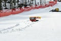 Two ratrak doing track maintenance