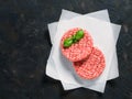 Two raw beef meat steak cutlets for burger with copy space Royalty Free Stock Photo