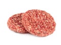 Two raw burger meats isolated on white Royalty Free Stock Photo