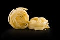Two raw dry nest pasta