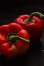 Two raw fresh red bell peppers or capsicum Royalty Free Stock Photo
