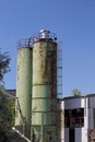 Two raw material silos on an abandoned factory site in Speyer