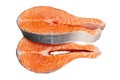 Two raw salmon fish steaks, isolated on white.