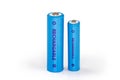 Two rechargeable batteries different sizes on a white background Royalty Free Stock Photo
