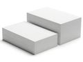 Two rectangular blocks of white foam material on a white background Royalty Free Stock Photo