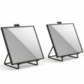 Two rectangular mirrors with black frame on stand against white background creating minimalist look Royalty Free Stock Photo
