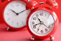 Two red alarm clocks with different times Royalty Free Stock Photo