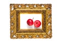 Two red apple in ancient antique golden picture frame Royalty Free Stock Photo