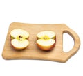 Two red apple on isolated kitchen board