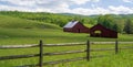 Two Red Barns in a Field