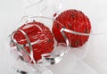 Two red beaded christmas ornaments with silver ribbon Royalty Free Stock Photo