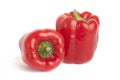 Two red bell peppers isolated in white background