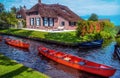 Two red boat in the Giethoorn canal Royalty Free Stock Photo