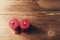 Two red candles tied with red ribbon, the symbol of Valentine`s day, mimics the relationship of men and women Royalty Free Stock Photo