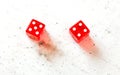 Two red craps dices showing Centerfield Nine Nina number 5 and 4 overhead shot on white board