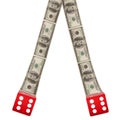 Two red dice with American dollars Royalty Free Stock Photo